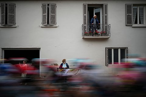 Spectators watch the pack during Sixth stage of the race 